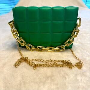 Green Cassette Flap Bag with Gold tone Hardware and Crossbody Strap